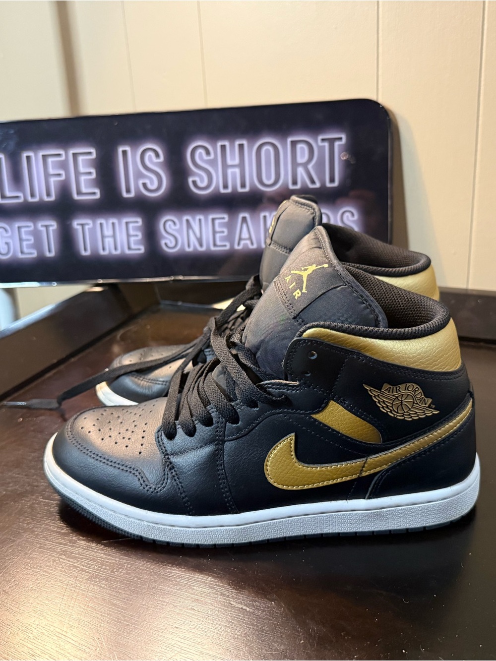 Nike Black and Gold High-Top Sneakers